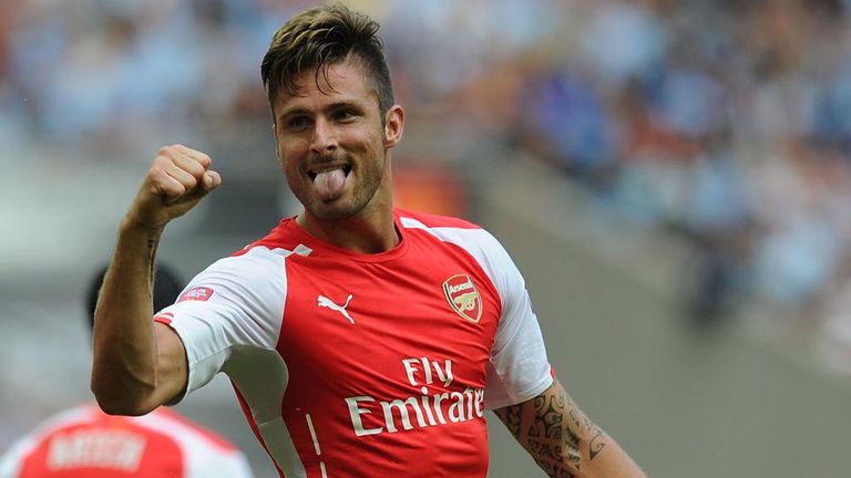 LONDON, ENGLAND - AUGUST 10:  Olivier Giroud celebrates scoring the 3rd Arsenal goal during the FA Community Shield match between Arsenal and 