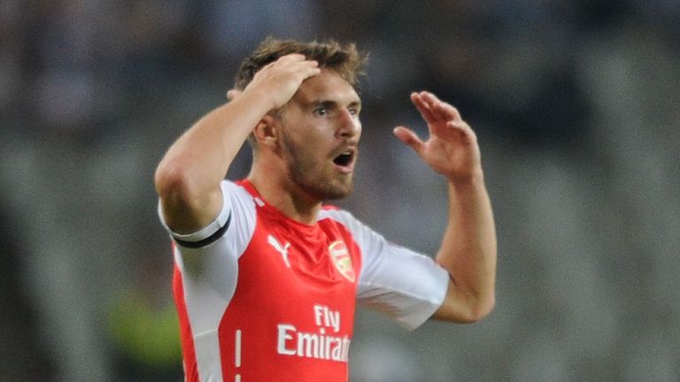 Aaron Ramsey reacts to being sent off for second bookable offence during the UEFA Champions League play-off first leg match between Besiktas and Arsenal