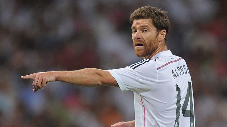 Xabi Alonso of Real Madrid reacts during the Supercopa first leg match between Real Madrid and Club Atletico de Madrid