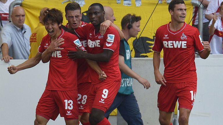 (L-R) Cologne's Japanese forward Yuya Osako, Austrian defender Kevin Wimmer, Nigerian forward Anthony Ujah and defender Jonas Hector celebrate