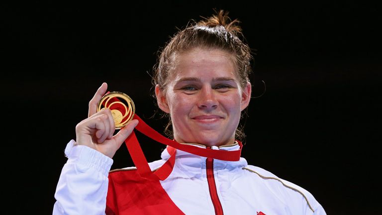 Middleweight boxer Savannah Marshall poses with her Commonwealth gold medal