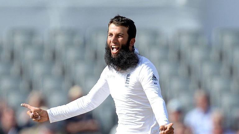 England's Moeen Ali celebrates taking the wicket of India's Ravindra Jadeja, during the Fourth Investec Test at Emirates Old Trafford, Manchester.
