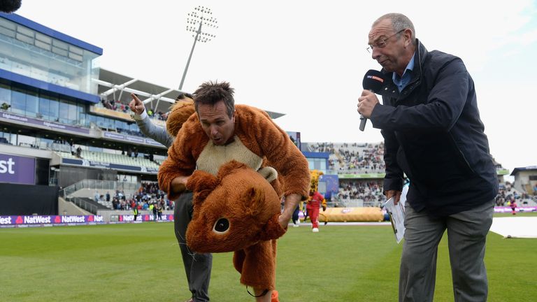 Former England captain Michael Vaughan is interviewed by David Lloyd as he takes part in the mascot race during Natwest T20 Blast
