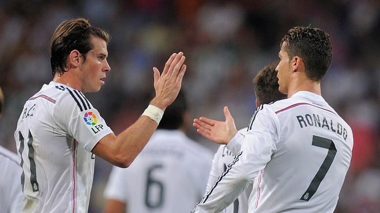 Cristiano Ronaldo of Real Madrid celebrates with Gareth Bale 