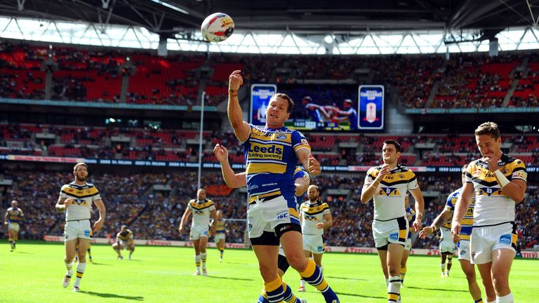 Leeds Rhinos' Danny McGuire celebrates scoring his sides second try of the game during the Tetley's Challenge Cup Final