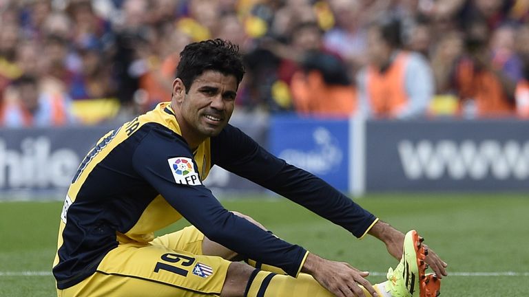 Atletico Madrid's Diego da Silva Costa reacts to a hamstring injury during the Spanish league football match FC Barcelona vs Club Atletico Madrid