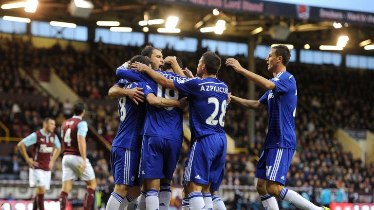 Chelsea's Diego Costa (centre) celebrates scoring his side's first goal of the game with teammates during the Barclays Premier League match at Turf Moor