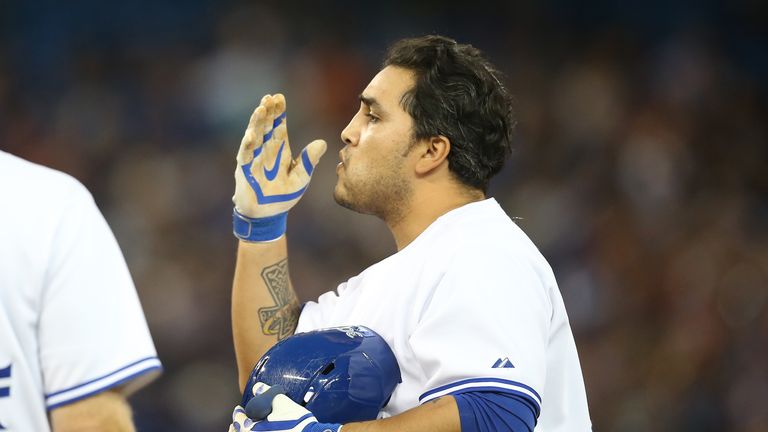 Dioner Navarro #30 of the Toronto Blue Jays celebrates after hitting a single in the fourth inning during MLB game action against the Detroit Tigers