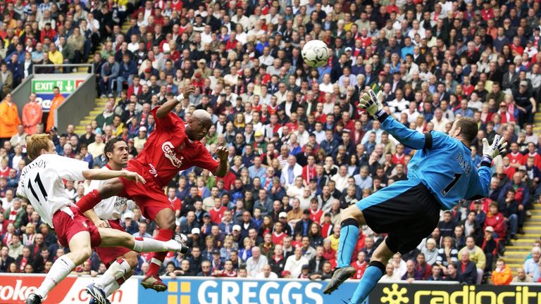 El Hadji Diouf of Liverpool beats Southampton keeper Paul Jones to score his second goal during the FA Barclaycard Premiership match at Anfield
