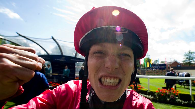 Emma Jayne-Wilson of Canada celebrates after riding Retirement Plan to win The Dubai Duty Free Shergar Cup Stayers