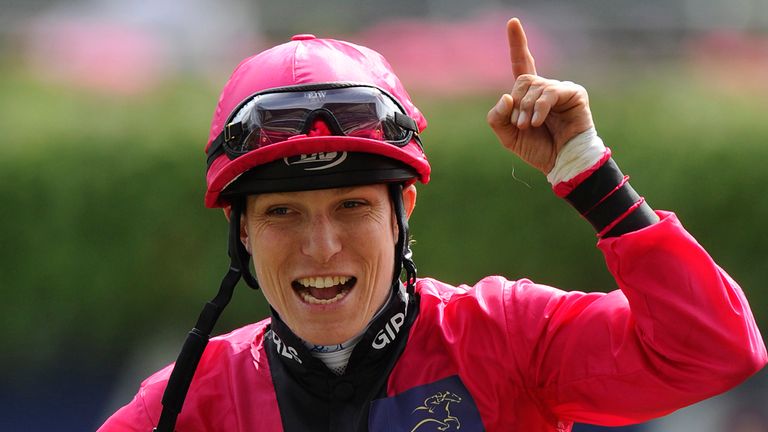 Emma-Jayne Wilson of Canada celebrates after riding Don't Call Me to win The Dubai Duty Free Shergar Cup Mile