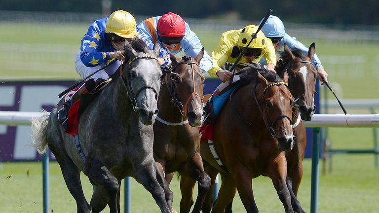 Energia Davos and Ryan Tate (left) win the Betfred Goals Galore Handicap at Haydock Park