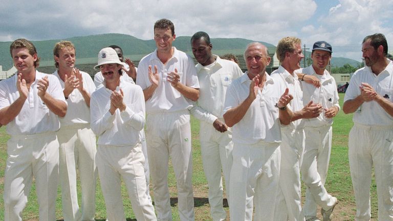 England, including Nasser (second right), reflect on their victory
