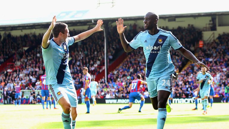 Carlton Cole (R): Celebrates with fellow goalscorer Stewart Downing