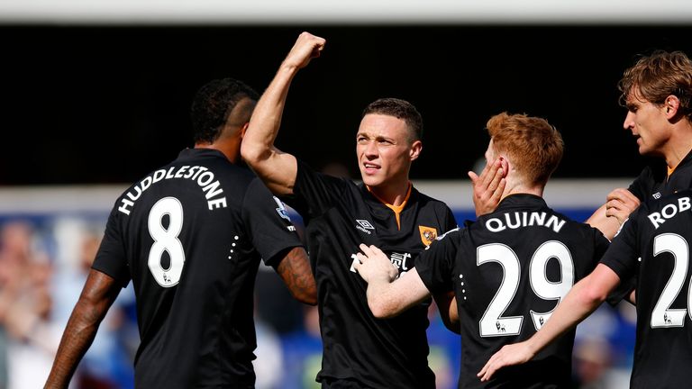 LONDON, ENGLAND - AUGUST 16:  James Chester of Hull City (2nd l) celebrates scoring the opening goal against Queens Park Rangers with teammates l-r Tom Hud