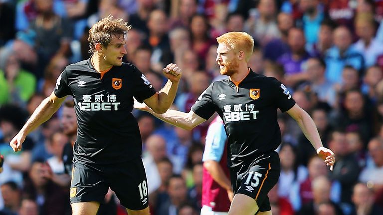 BIRMINGHAM, ENGLAND - AUGUST 31: Nikica Jelavic of Hull City celebrates scoring his team's opening goal with Paul McShane of Hull City during the Barclays 