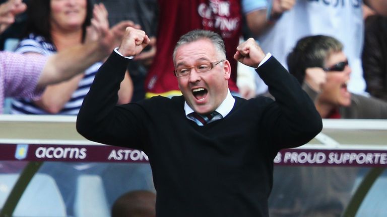 BIRMINGHAM, ENGLAND - AUGUST 31: Paul Lambert, manager of Aston Villa celebrates the goal scored by Andreas Weimann during the Barclays Premier League matc