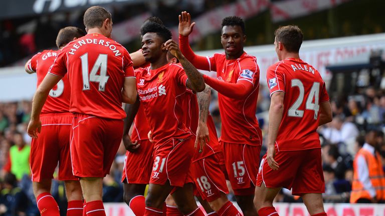 LONDON, ENGLAND - AUGUST 31:  Raheem Sterling of Liverpool celebrates with team mates after scoring the first goal during the Barclays Premier League match