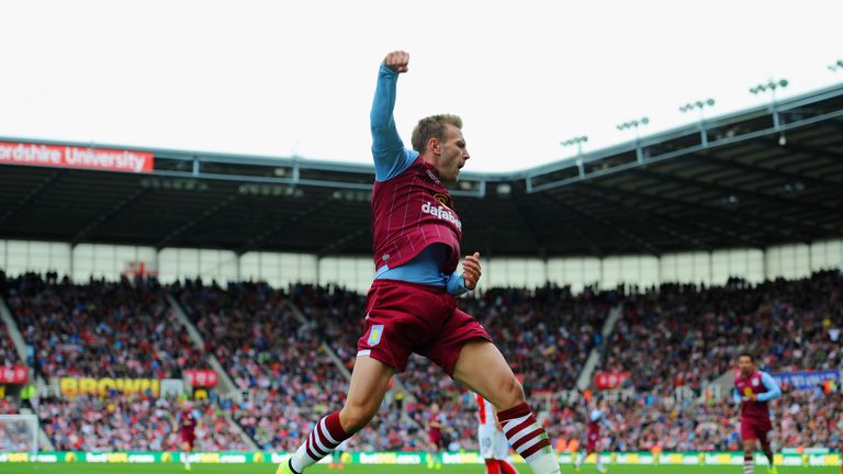 STOKE ON TRENT, ENGLAND - AUGUST 16:  Andreas Weimann of Aston Villa celebrates scoring the opening goal during the Barclays Premier League match between S