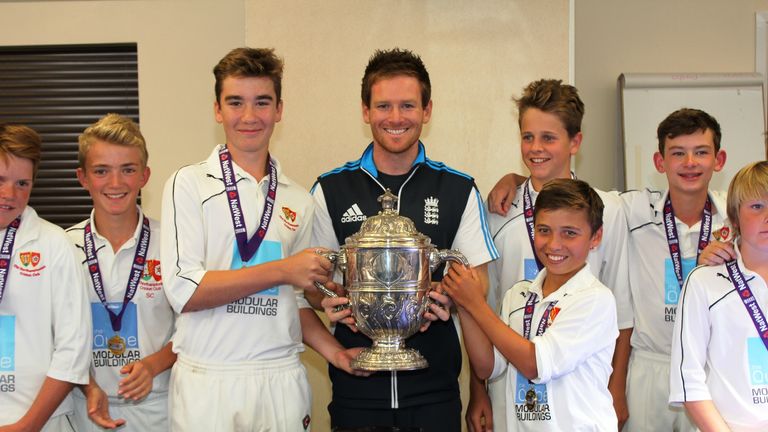 England cricketer Eoin Morgan together with Old Northamptonians CC, winners of the NatWest U13 National Club Championship.
