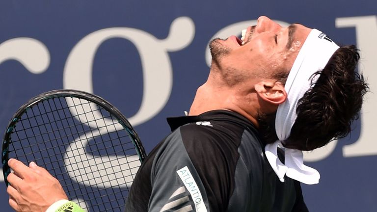 Fabio Fognini of Italy reacts to point against Andrey Golubev of Kazakhstan during their US Open 2014 men's singles match