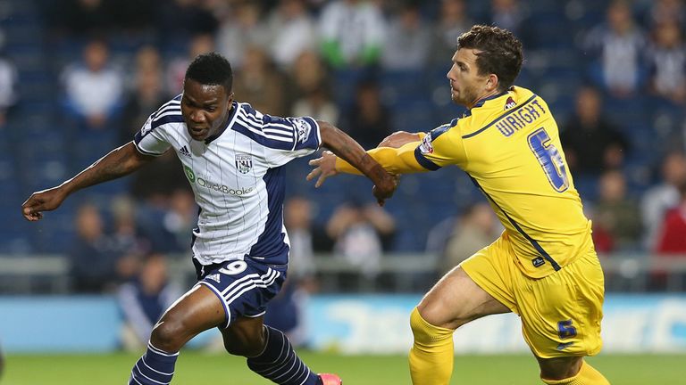 WEST BROMWICH, ENGLAND - AUGUST 26:   Brown Ideye of West Bromwich moves away from Jake Wright during the Capital One Cup second round match between West B