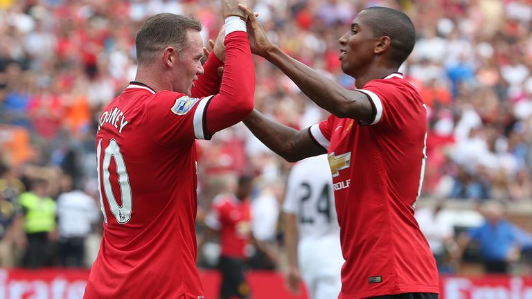 Wayne Rooney and Ashley Young celebrate as Manchester United go 2-1 up against Real Madrid