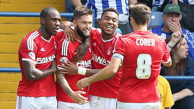 SHEFFIELD, ENGLAND - AUGUST 30:  Henri Lansbury (2nd L) of Nottingham Forest celebrates with team mates after scoring the opening goal during the Sky Bet C