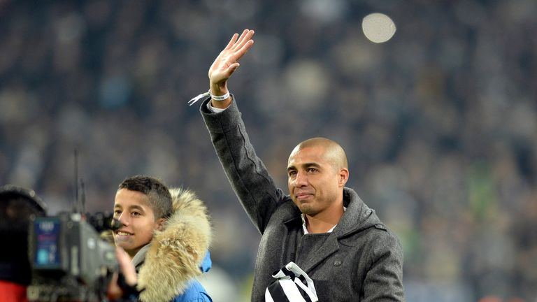 Former Juventus player David Trezeguet greets fans prior to the Serie A match between Juventus and AS Roma