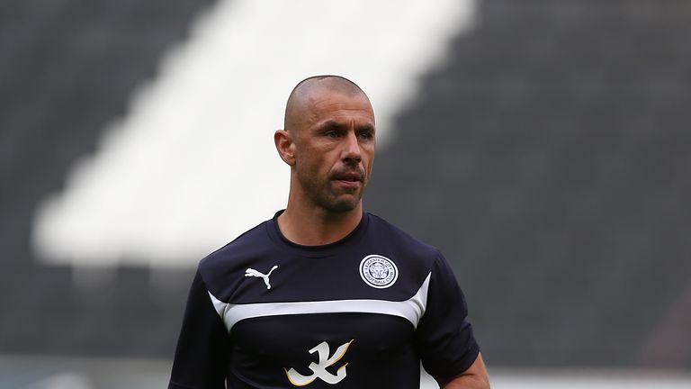 Leicester City first team coach Kevin Phillips looks on as the players warm up prior to the Pre-Season Friendly match be
