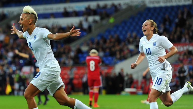 England forward Lianne Sanderson (l) celebrates after scoring the fourth England goal during the FIFA 2015 Women's World Cup qualifier v Wales