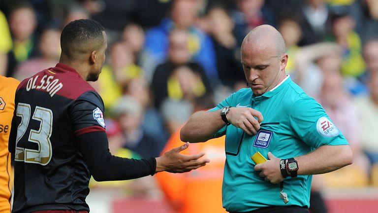 WOLVERHAMPTON, ENGLAND - AUGUST 10:  Martin Olsson of Norwich City is seen before being shown the red card by referee Simon Hooper during the Sky Bet Champ