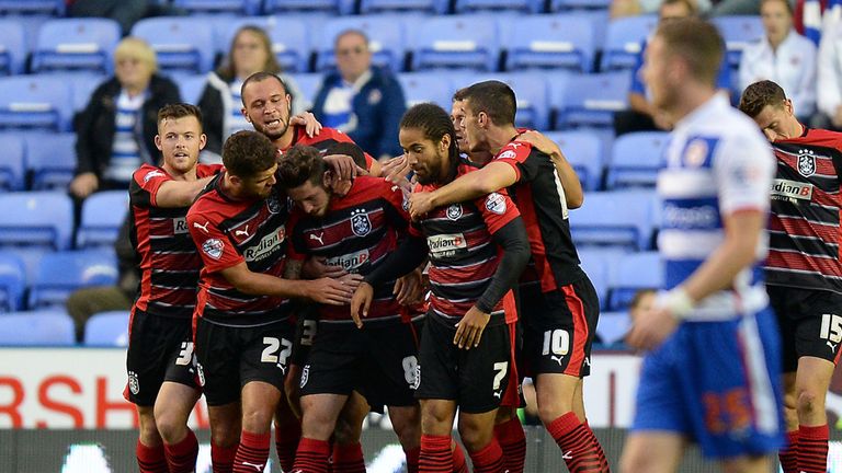 Huddersfield Town's Jacob Butterfield (centre left) celebrates with his team mates after he scores their side's first goal of the game