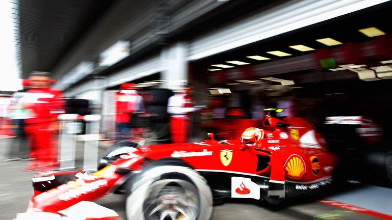 Kimi Raikkonen leaves the garage