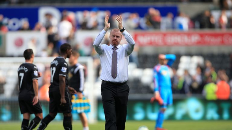 Burnley manager Sean Dyche acknowledges the fans after the final whistle in the Barclays Premier League match at the Liberty Stadium, Swansea.