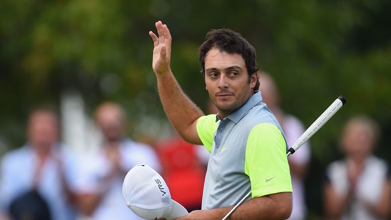 Francesco Molinari of Italy celebrates on the 18th hole during the first round of the 71st Italian Open