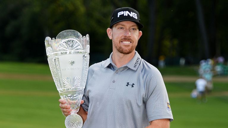 PARAMUS, NJ - AUGUST 24:  Hunter Mahan celebrates with the tournament trophy after winning of The Barclays at The Ridgewood Country Club on August 24, 2014