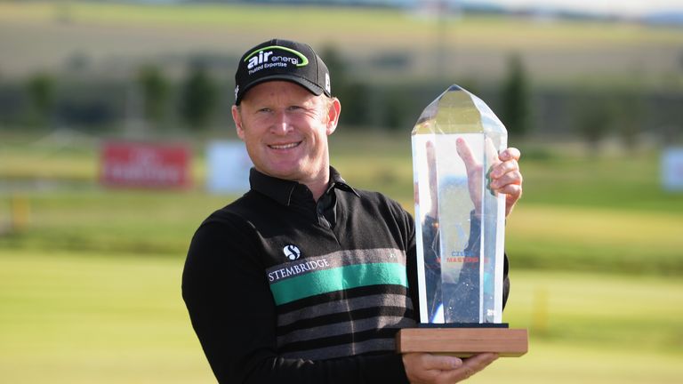 Jamie Donaldson of Wales poses with the trophy after winning the D+D Real Czech Masters during day four