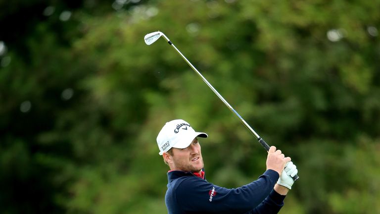 AALBORG, DENMARK - AUGUST 16:  Marc Warren of Scotland plays his second shot on the 18th hole during the third round of the Made In Denmark at Himmerland G