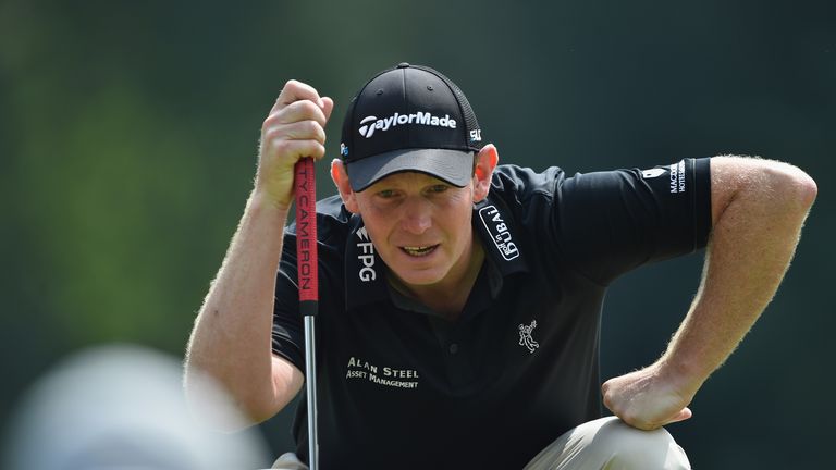 Stephen Gallacher lines up a putt during the final round of the Italian Open at Circolo Golf Torino