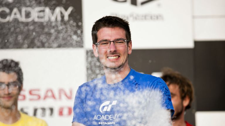 Gaetan Paletou celebrates on the podium