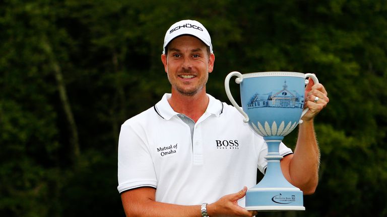 Henrik Stenson of Sweden with the trophy after winning the Deutsche Bank Championship at TPC Boston 2013
