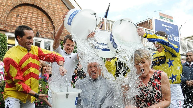 Off the track Frankie Dettori and television presenter Clare Balding take part in the 'Ice Bucket Challenge'
