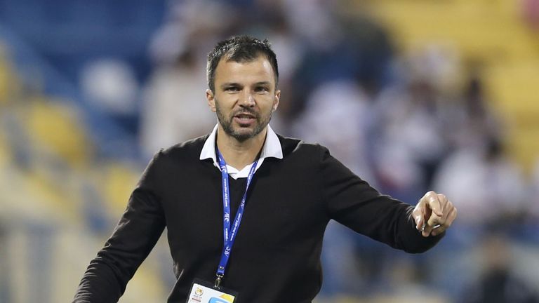 Bahrain's head coach, Anthony Hudson gestures to his players during the Asian Cup qualifying group D football match Qatar versus Bahrain in the Thani Bin J