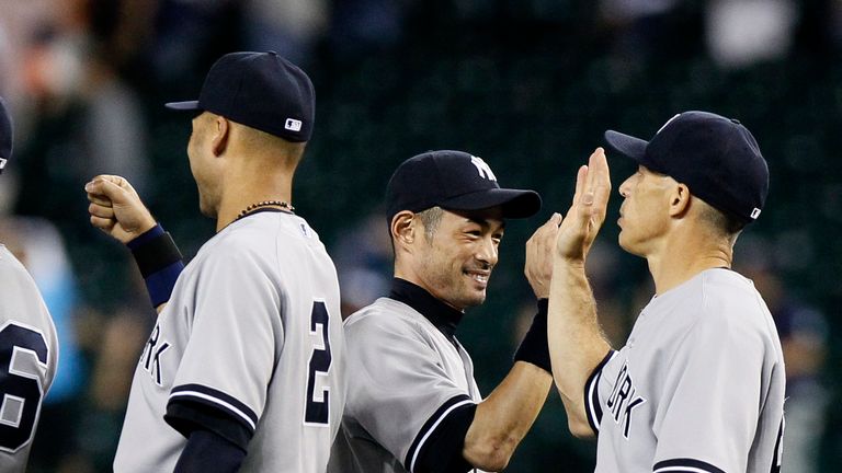 Ichiro Suzuki (centre) celebrates after the New York Yankees beat the Detroit Tigers