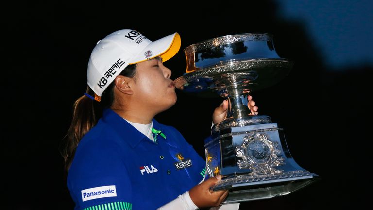 Inbee Park of South Korea celebrates with the trophy after winning the Wegmans LPGA Championship at Monroe Golf Club on August 1