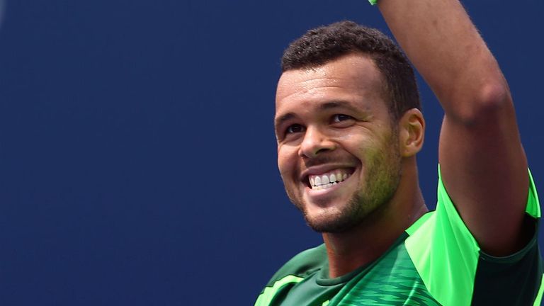 Jo-Wilfried Tsonga of France celebrates his win against Novak Djokovic of Serbia during 2014 Rogers Cup