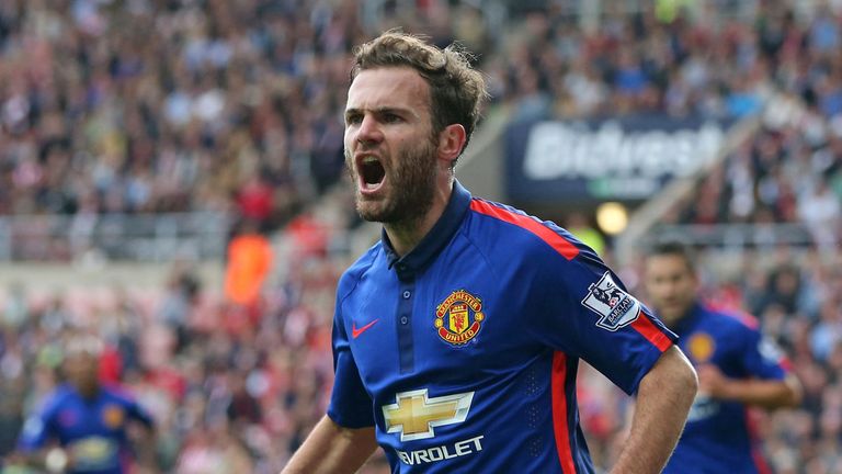 Manchester United's midfielder Juan Mata opens the scoring against Sunderland with a tap in at the back post.