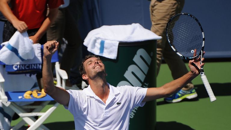 Julien Benneteau celebrates at the Western & Souther Open