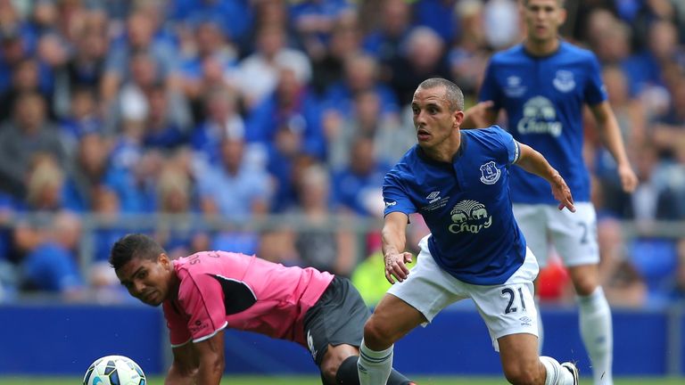 Leon Osman wins the ball from Casemiro during the pre-season friendly between Everton and Porto.